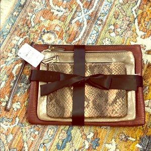NWT Neiman Marcus zipped pouch set